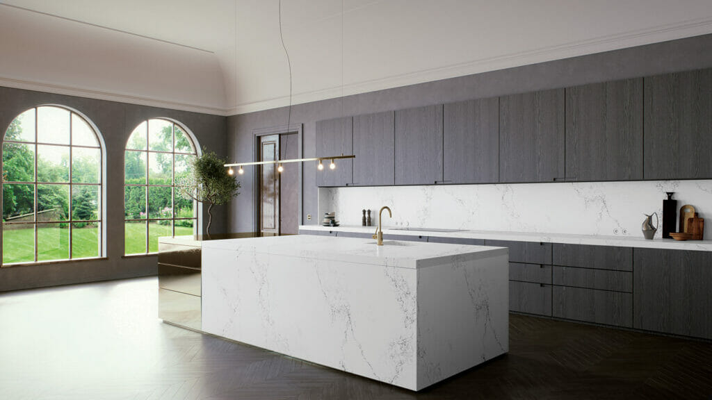 grey kitchen with white backsplash and counter