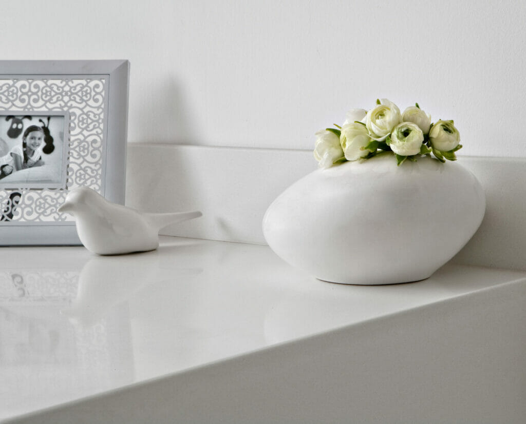 white quartz countertop with plant