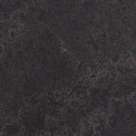 Dark, textured surface with subtle marbling and irregular fine patterns throughout.