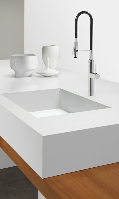 Modern white laundry room countertop or bathroom counter and sink 