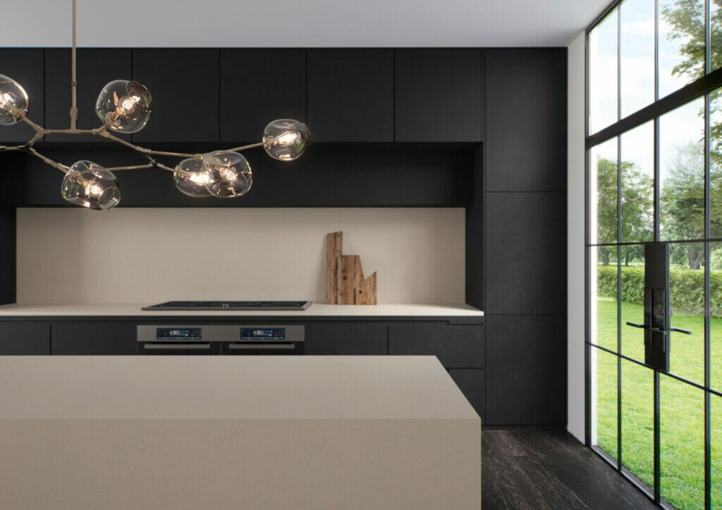 Black kitchen with grey island 