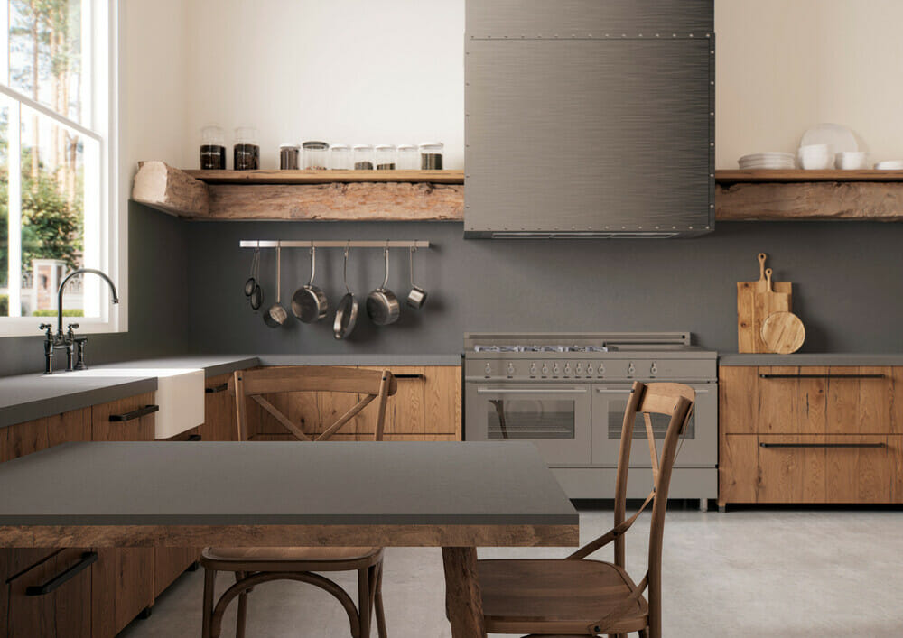 kitchen with grey backsplash and counters