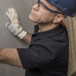 man checking granite