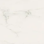 White marble surface with subtle gray veins running through it.