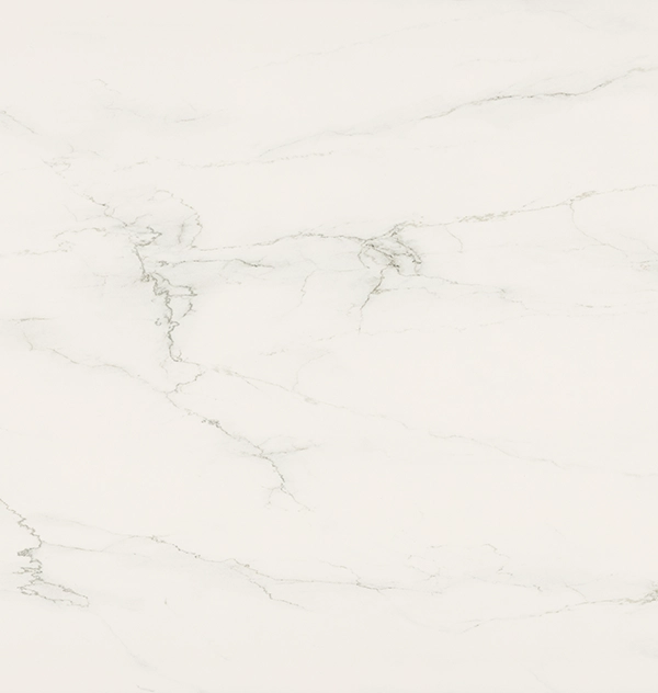 Caesarstone Porcelain 501 Snowdrift White surface with subtle gray veins running through it.