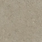 Caesarstone Porcelain 544 Auralux beige textured surface, resembling paper or fabric, with subtle color variations.