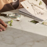 Marbannova porcelain countertop in white with gold, taupe, and gray veining